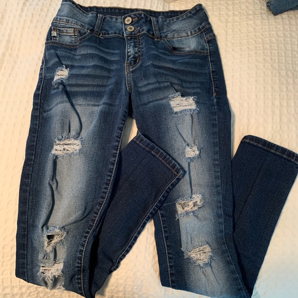 Ripped blue jeans